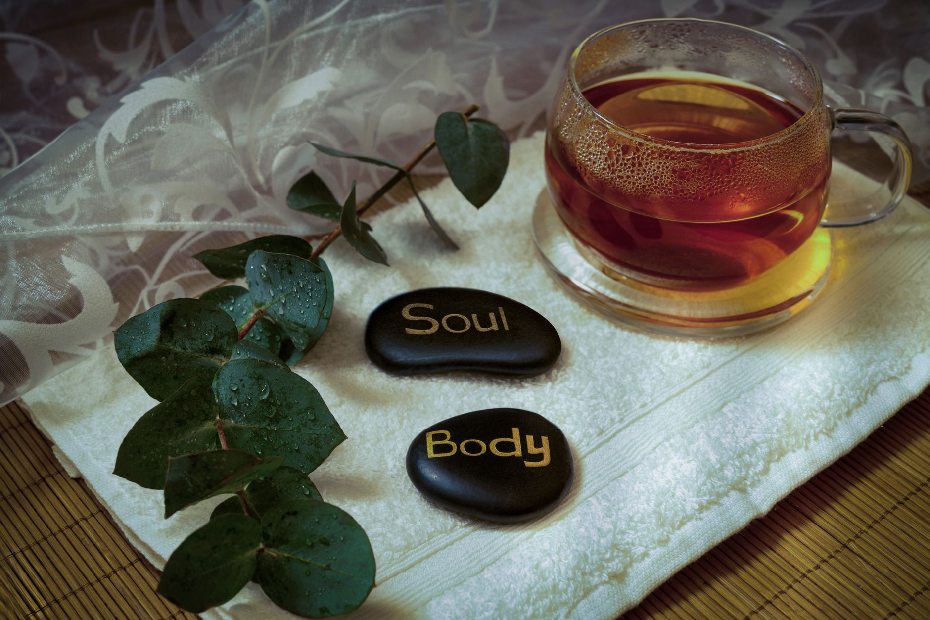 relaxing tea and spa setting with soul and body stones